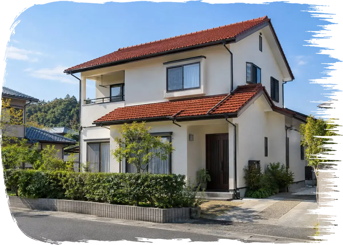 塗り替えを終えた二階建ての家